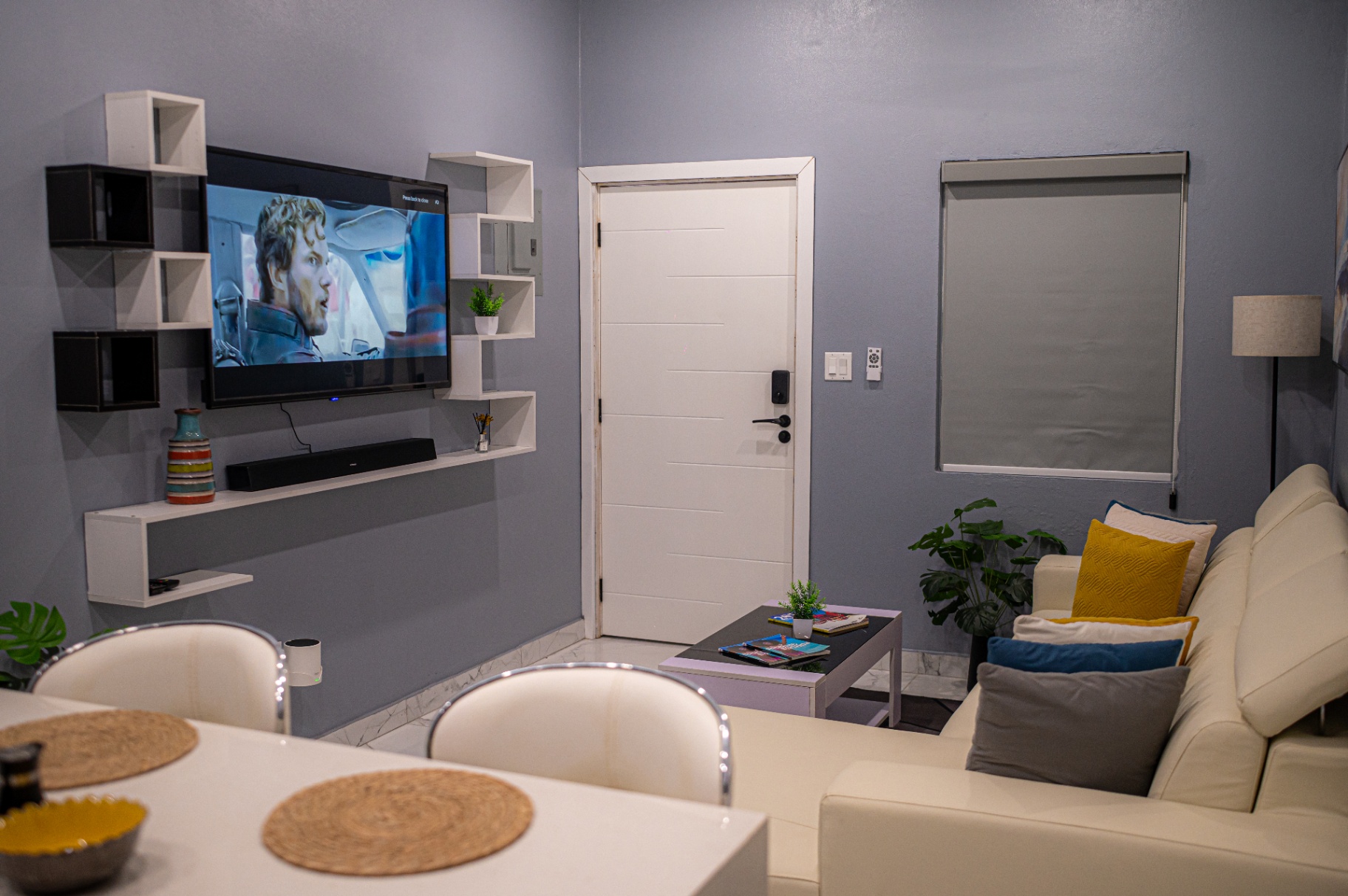 Living room with wall-mounted TV