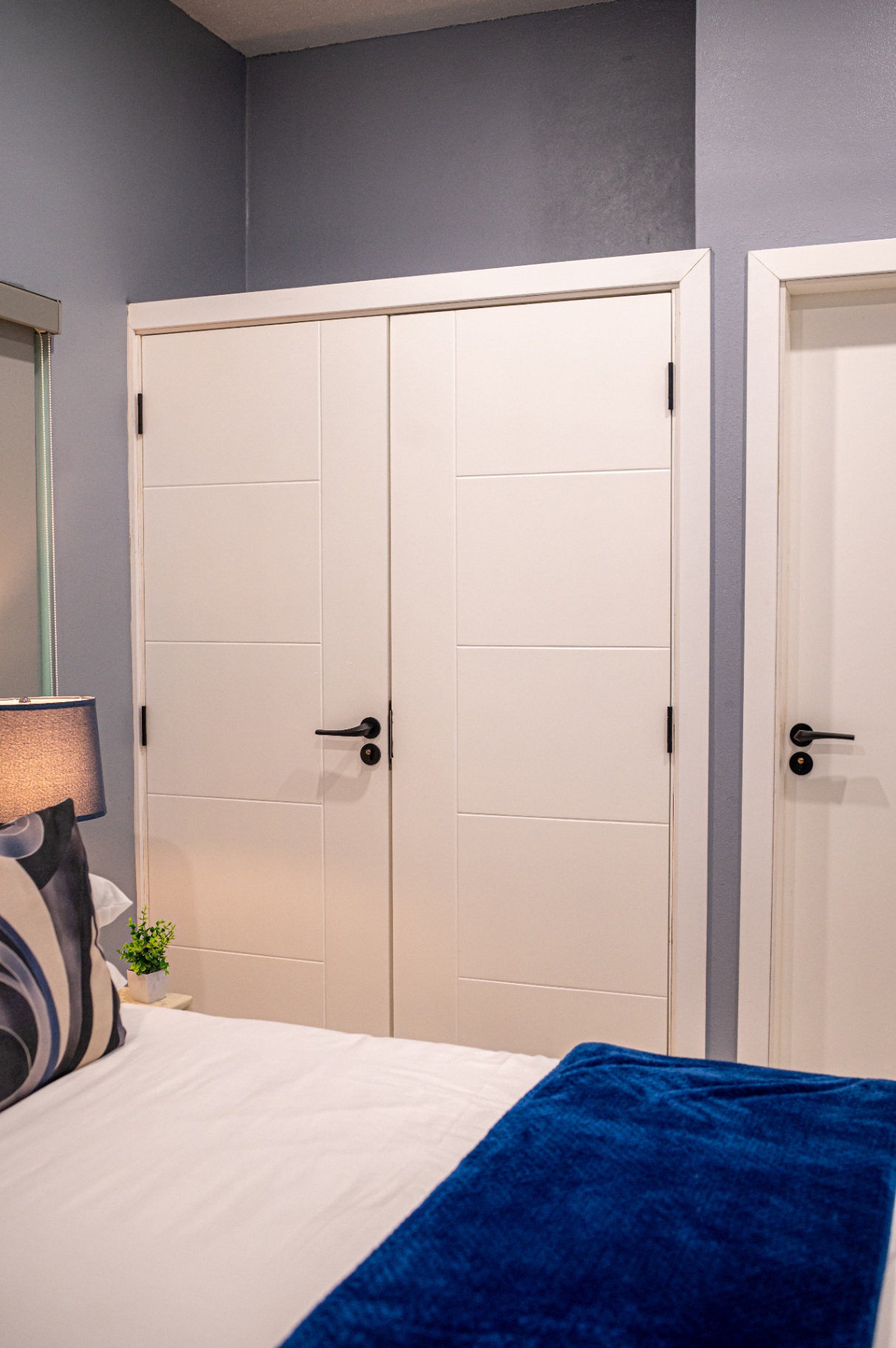 Apartment 3 bedroom detail with decorative pillows